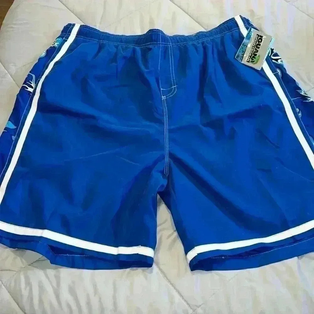 Iguana Men’s Swim Trunks 
Size 3Xl
W 43”
R 16”
I 8”
Polyester 
Machine Wash